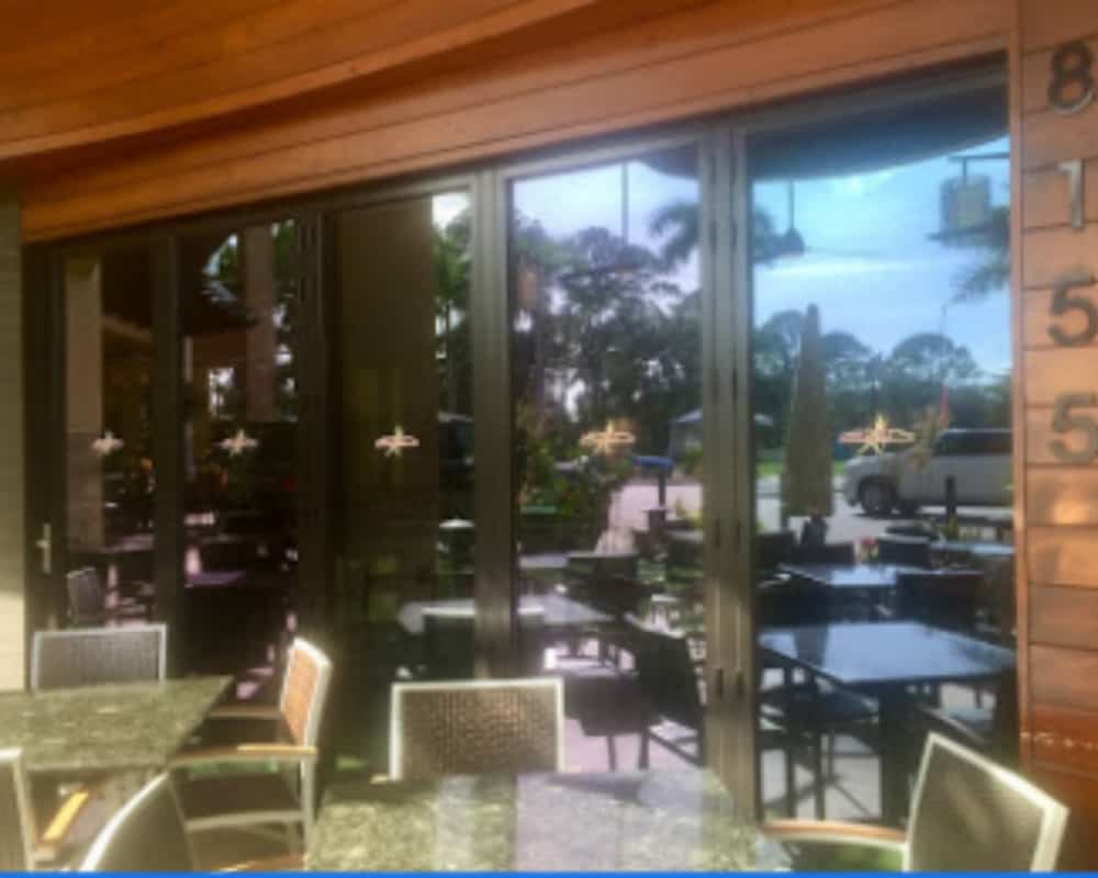 Restaurant patio glass with professionally installed window tint